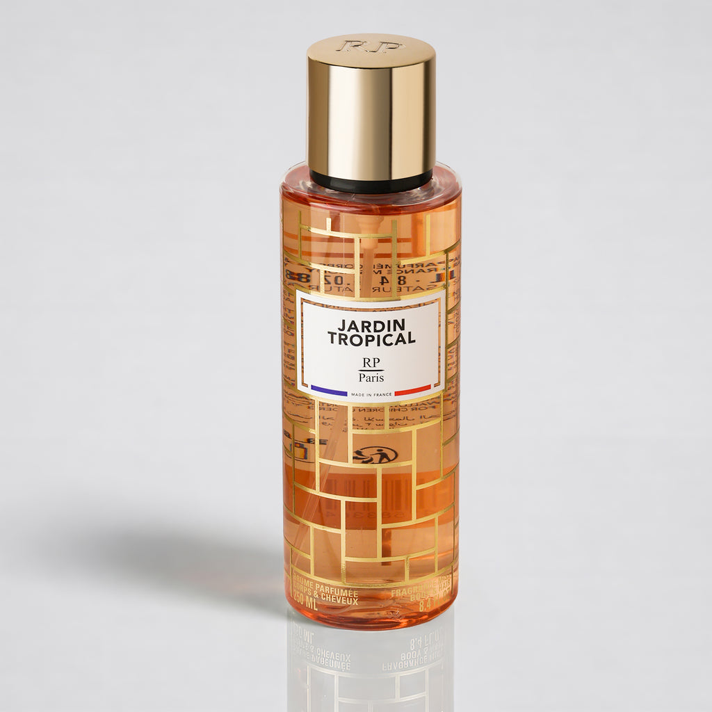Perfume bottle labeled 'Jardin Tropical' with gold cap on a light gray background