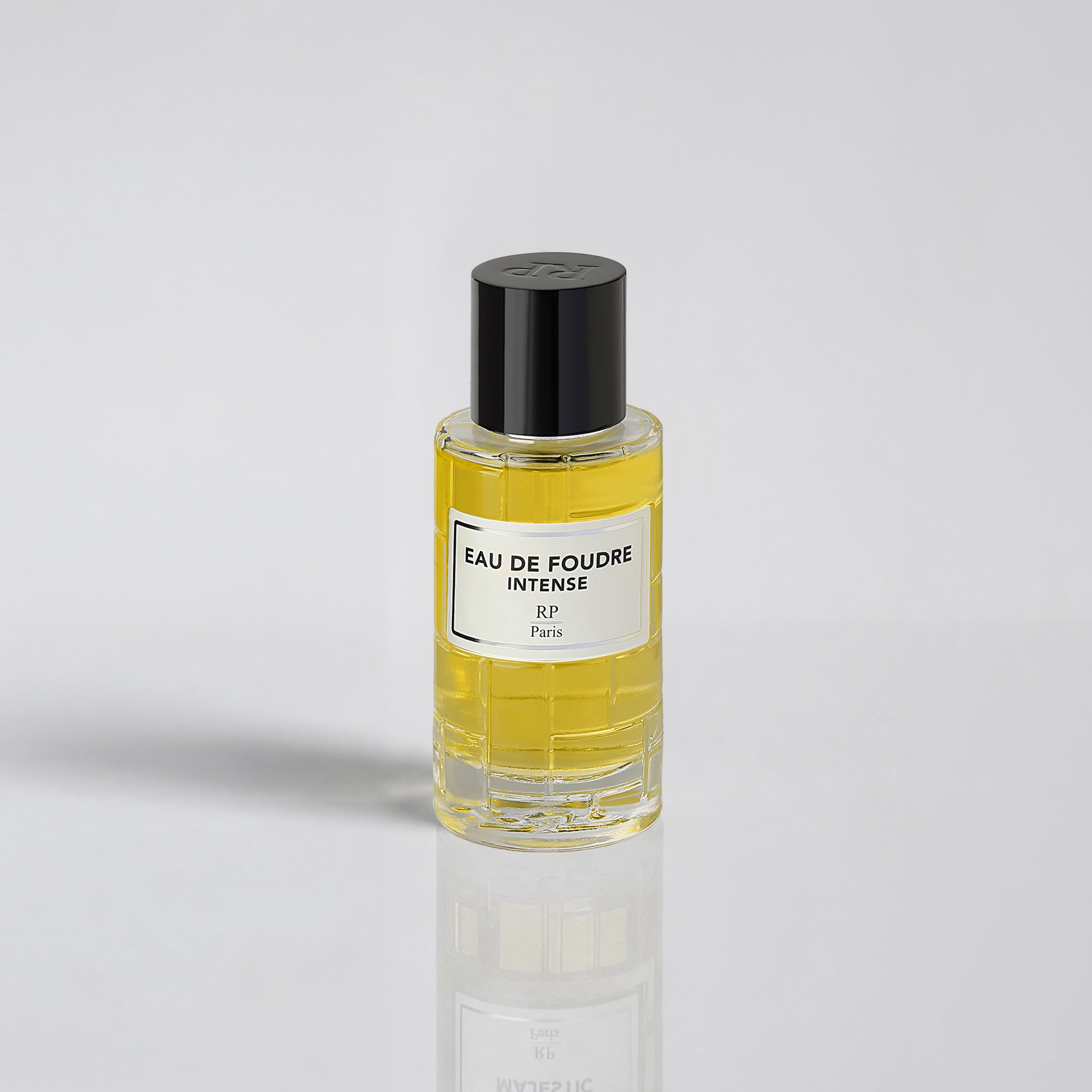 Perfume bottle labeled 'Eau de Foudre Intense' on a light gray background