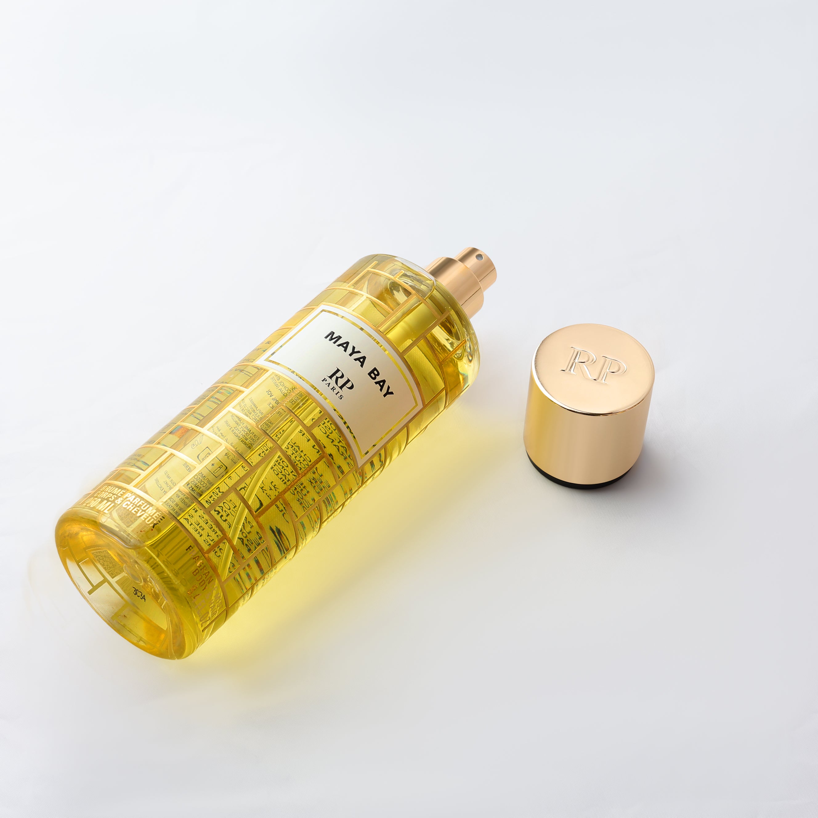 Maya Bay RP perfume bottle with gold cap on a light gray background