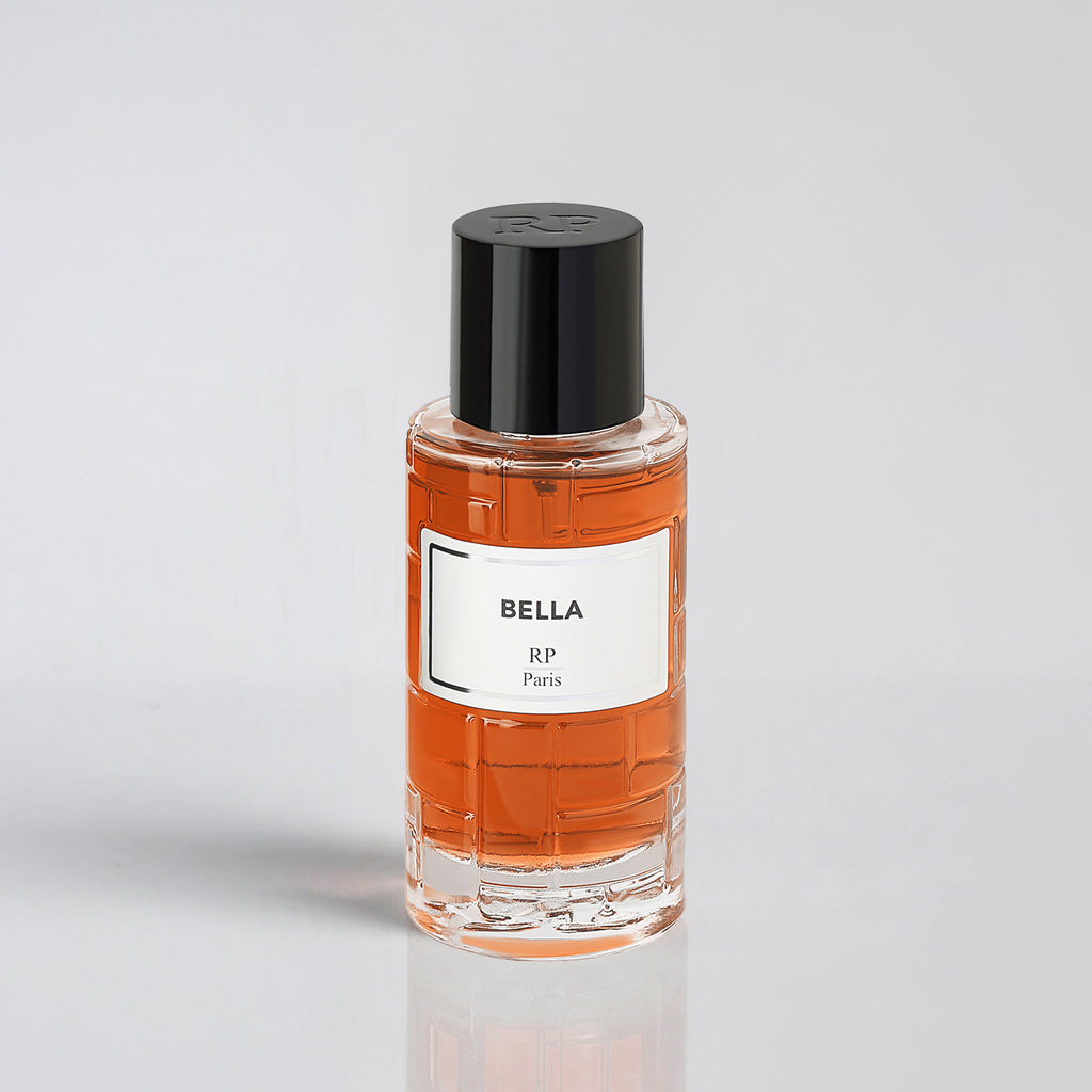 Perfume bottle labeled 'Bella RP Paris' on a light gray background