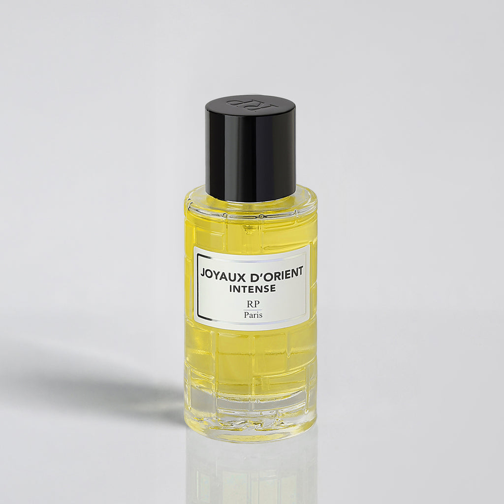 Perfume bottle labeled 'Joyaux d'Orient Intense' by RP Paris on a light gray background