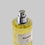 Perfume bottle labeled 'Majestic' by RP Paris on a gray background