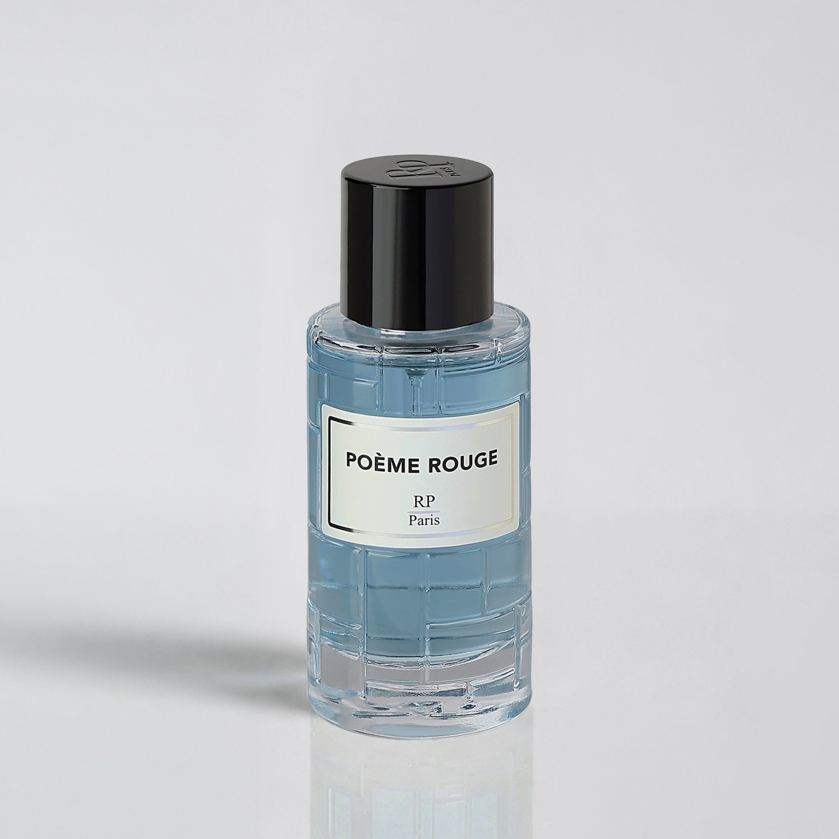 Clear bottle with black cap and white label on a light gray background
