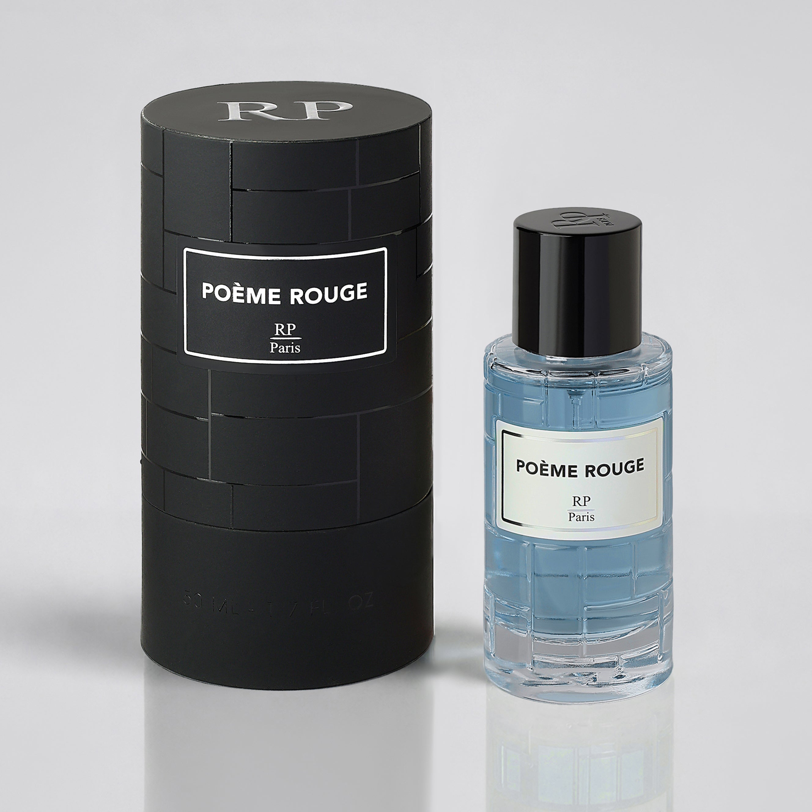 Poème Rouge perfume bottle and packaging on a light gray background