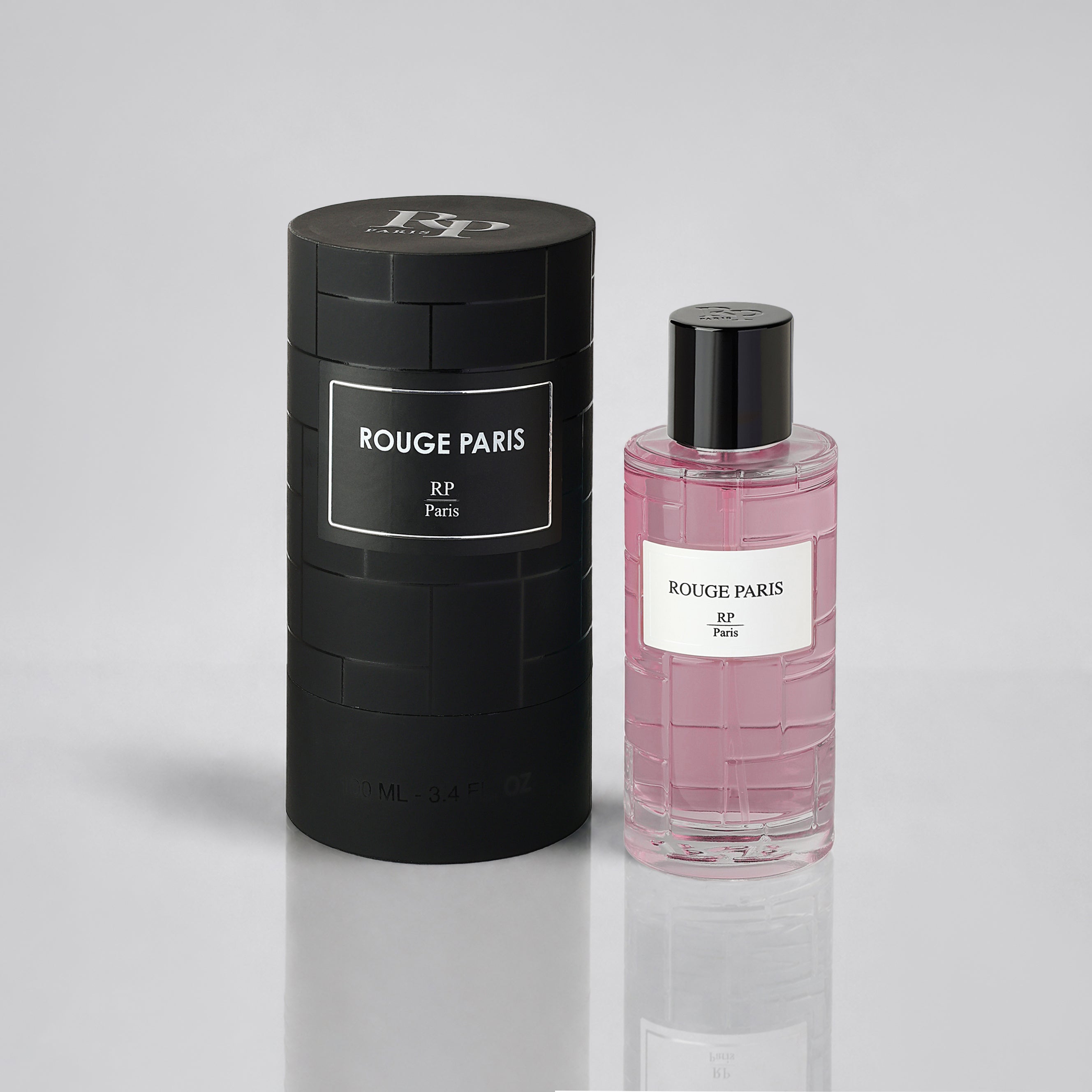 Rouge Paris perfume bottle and packaging on a light gray background
