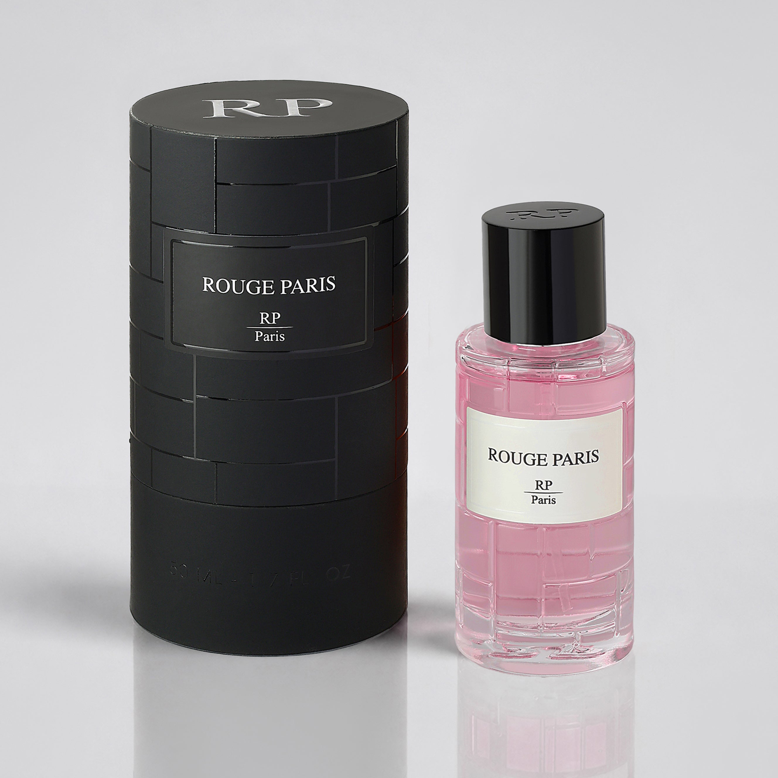 Rouge Paris perfume bottle and packaging on a light gray background