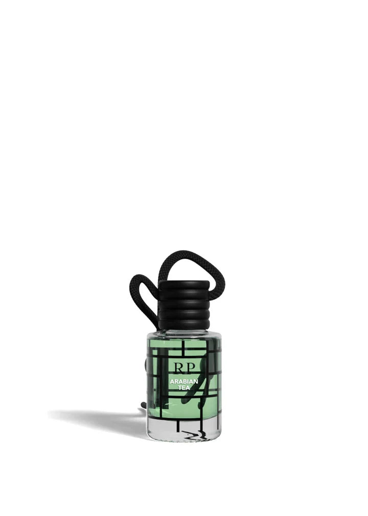 A small clear bottle with a black cap and black hanging loop, filled with pale mint green liquid. The bottle has a black geometric grid label with the letters RP and the words 'Raspberry Bay', photographed on a clean white background.