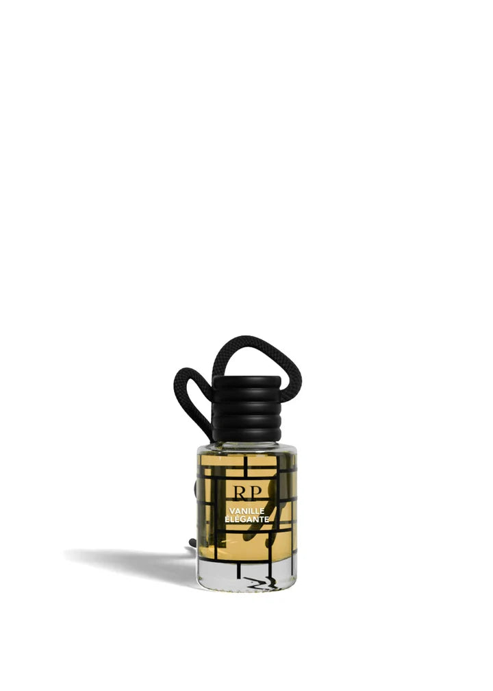 A small clear glass bottle with a black cap and black loop handle, filled with pale yellow liquid. The bottle has a black and gold geometric label with the letters 'RP' and text reading 'Raspberry Hill Vineyard'.