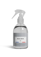 A clear plastic spray bottle with a white trigger sprayer and a white label reading 'MUSC NEIGE' on a clean white background.