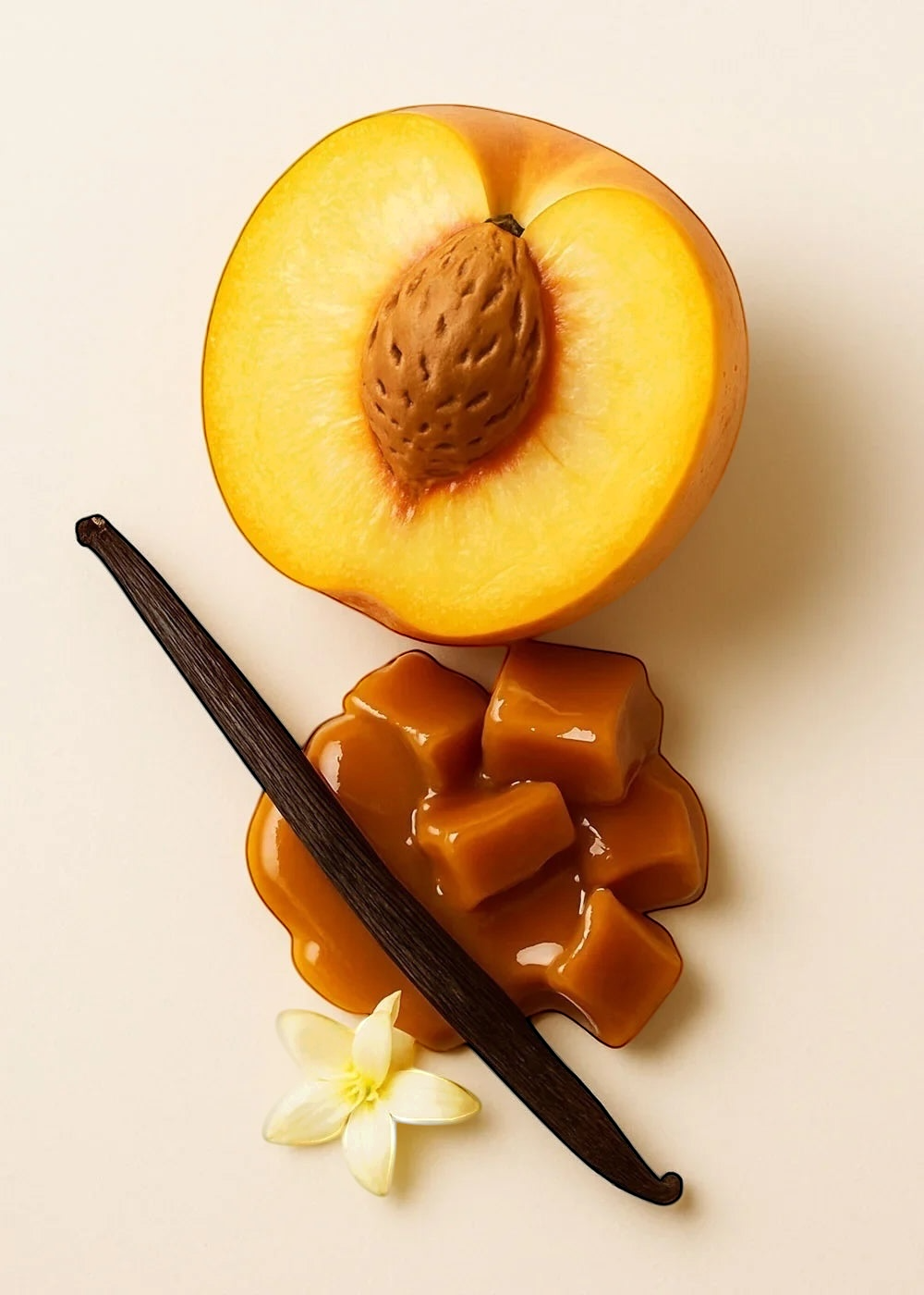 Half-cut peach with caramel candies, vanilla bean, and a white flower on a beige background