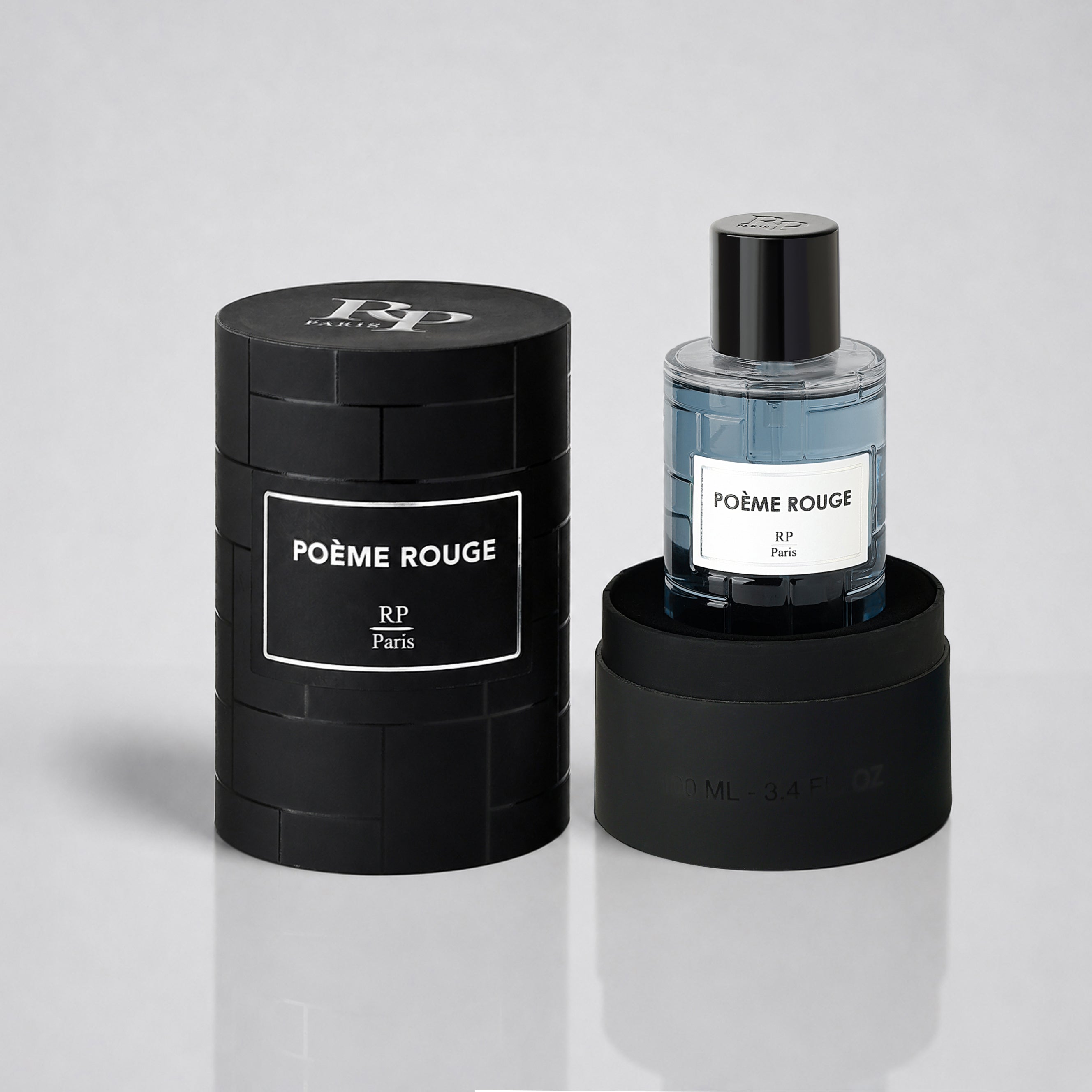 Perfume bottle and packaging of Poème Rouge by RP Paris on a light gray background