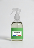 RP PARIS Baie d'Alger scented fabric spray in a clear bottle with a green label, made in France.