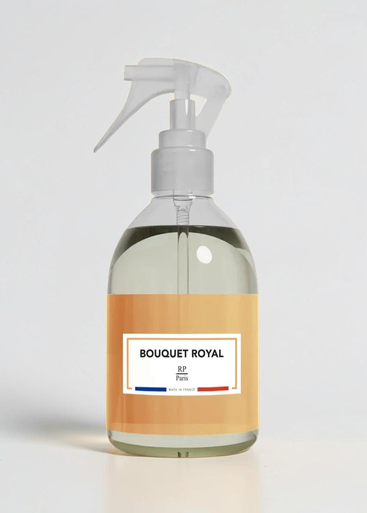 RP PARIS Bouquet Royal scented fabric spray in a clear bottle with a white trigger sprayer on a tan background.
