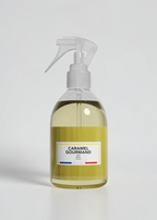 RP PARIS Caramel Gourmand scented fabric spray in a clear bottle with a yellow label and trigger sprayer