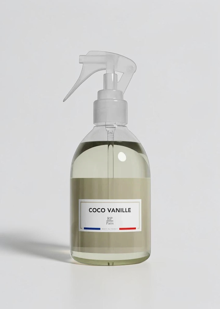 RP PARIS Coco Vanille scented fabric spray in a clear bottle with a minimalist label and trigger sprayer