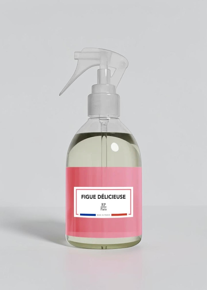 RP PARIS Figues délicieuses scented fabric spray in a clear bottle with a pink label, made in France.